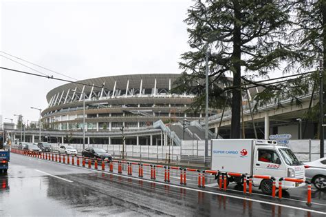 exclusive: kengo kuma's completed olympic stadium for tokyo 2020