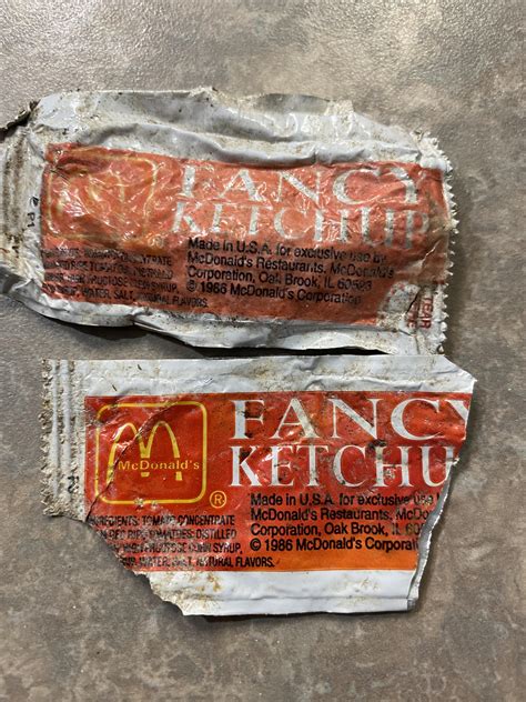 Old ketchup packets from McDs found while digging in backyard : nostalgia