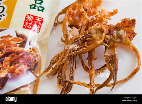 Japanese dried squid snack Stock Photo - Alamy