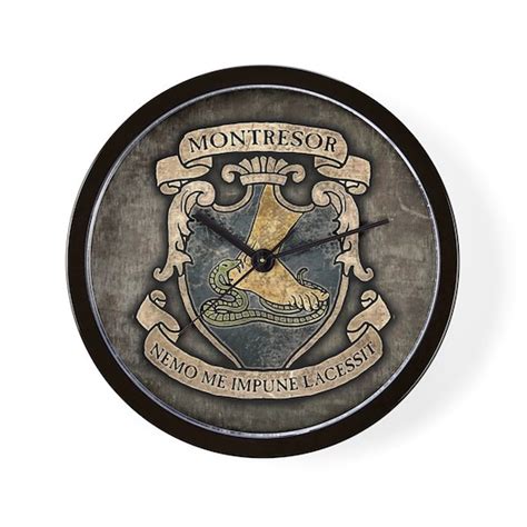 MONTRESOR-COAT-OF-ARMS_13-5x18 Wall Clock by MissThree - CafePress