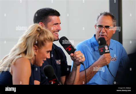 NFL Network show host Amber Theoharis, analyst David Carr and reporter Michael Silver on the set ...