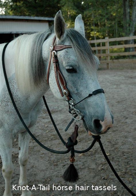 Susan added a horse hair tassel to match her reins and add that extra-special touch. http://knot ...