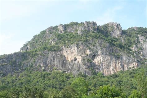 Premium Photo | Limestone mountains in thailand there are many bats living there