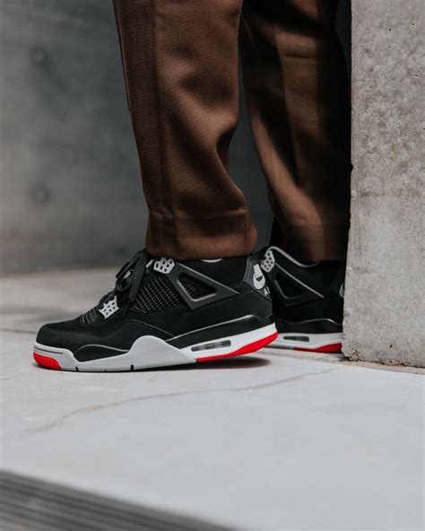 Here's How the 2019 Air Jordan 4 Black/Red Looks On Foot | Nice Kicks