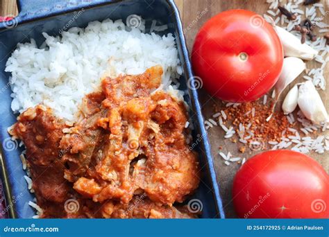 Tomato Bredie or Stew. a Traditional South African Cuisine Made with Tomatoes, Lamb and Potatoes ...