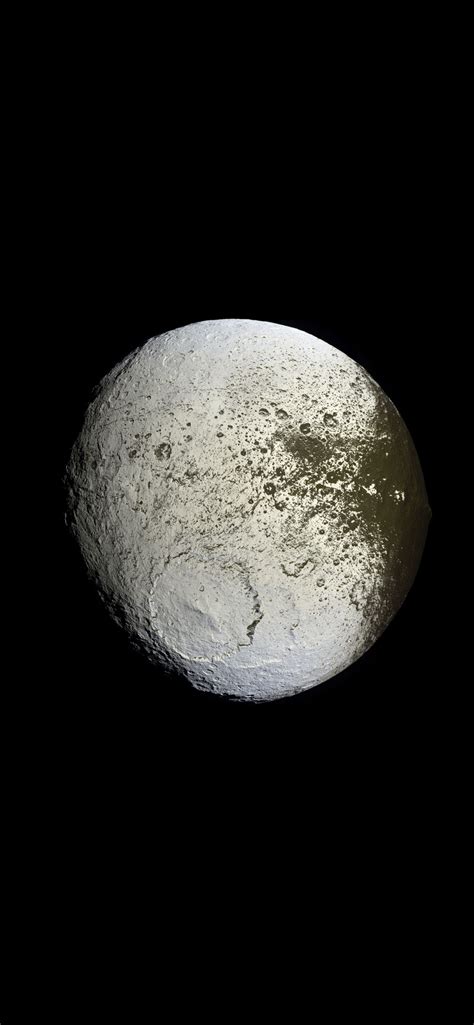 Saturn's moon Iapetus (1242x2688) : r/Amoledbackgrounds