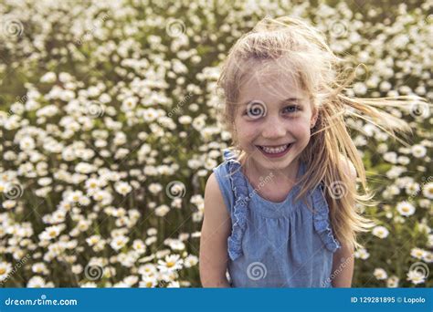 Child on Green Daisy Grass in a Summer Park Sunset Time Stock Image ...