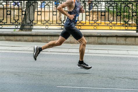 Athletic Male Runner Running Marathon Stock Photo - Image of muscular ...