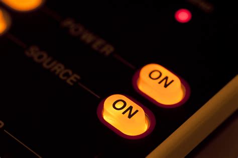 Free Stock Photo 13776 Illuminated orange on off power buttons | freeimageslive