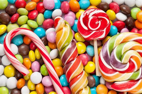 Colorful candies and lollipops Stock Photo by ©karandaev 126751244