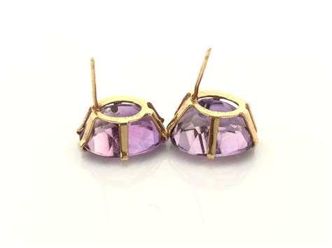 Lot - 14K Gold Amethyst Earrings