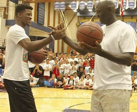 Michael Jordan, Jimmy Butler compete in shooting contest at youth camp ...