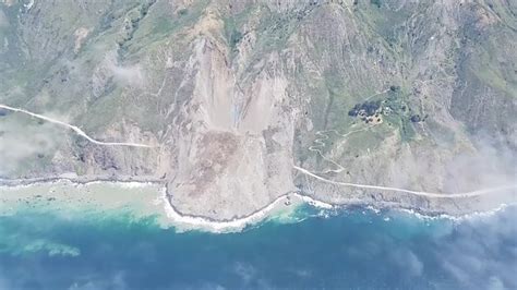 A portion of California's Highway 1 is buried after a massive landslide ...