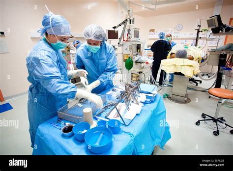 Nurses in operating theatre, Lariboisiere hospital Stock Photo - Alamy