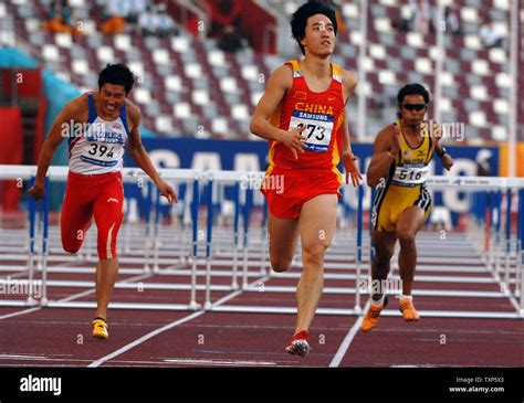 China's world record holder Xiang Liu (C) wins the gold medal in the ...