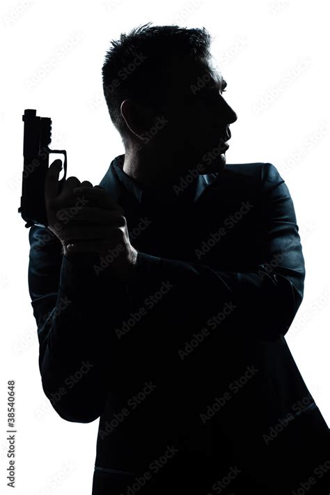 silhouette man portrait with gun Stock Photo | Adobe Stock