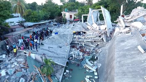 More than 1,200 dead in earthquake as Haiti braces for tropical storm