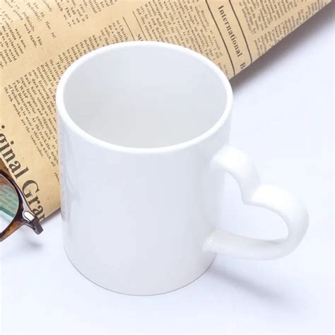 White 11 Oz Ceramic Coffee Mugs For Sublimation Heart Shaped Design ...