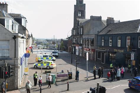 Bathgate town centre evacuated after worried shoppers spotted suspicious package dumped inside ...