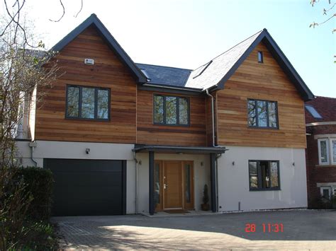 Front view of Oxford house Trinity Properties. PTGV planed 135mm cover western red cedar ...