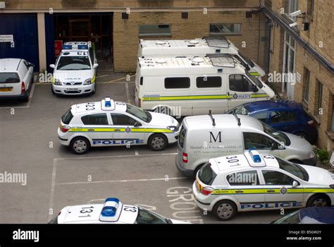 Police cars in a West Yorkshire police station car park Stock Photo - Alamy