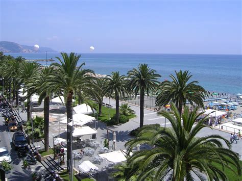 Palm trees on the beach in Loano, Italy wallpapers and images ...