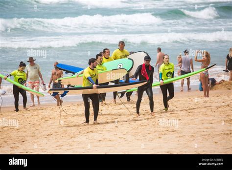 People having a surfing lesson on Manly beach with Manly surf school ...