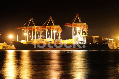 Cargo Container Ship At Night Stock Photo | Royalty-Free | FreeImages