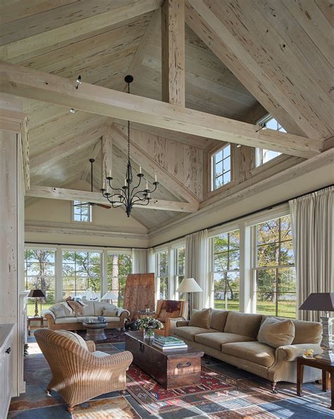 Great room at waterfront estate with beams and paneled cathedral ceiling | Farm house living ...