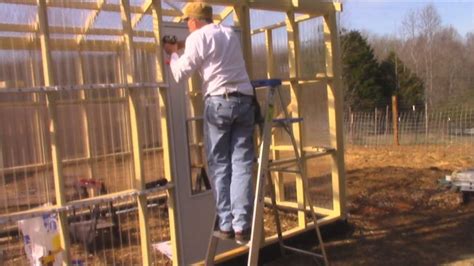 The Homestead Handyman installs TUFTEX PolyCarb Clear panels on his greenhouse near Greenville ...