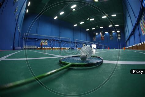 Image of Shuttle And Badminton Bat in A Shuttle Badminton Indoor ...