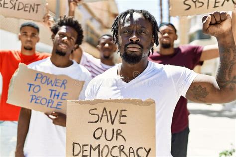 Group of Young African American Activists Holding Protest Banner ...