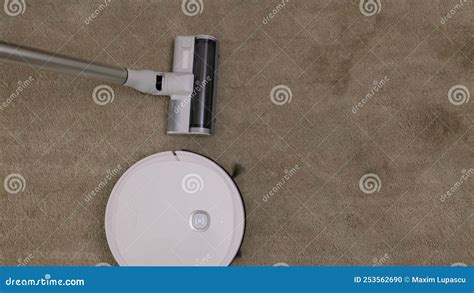 Vacuum Robot and Classic Vacuum Cleaner Comparison Stock Footage ...