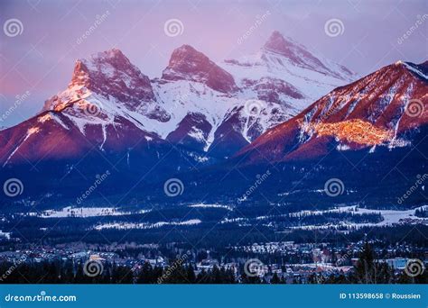 Three Sisters Mountain View at Sunrise Time in Canmore Town, Canada ...