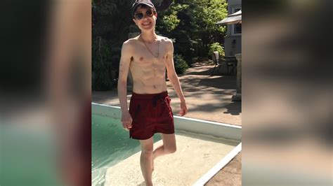 Elliot Page shares joyful 'first swim trunks' photo at pool on Instagram - ABC30 Fresno