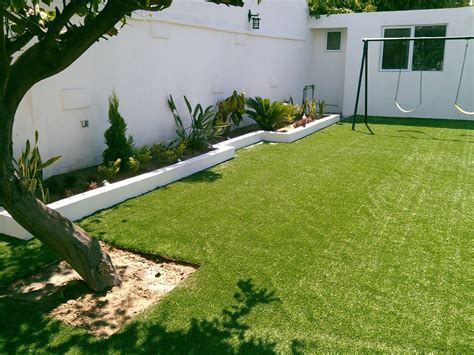 Skalk Exclusión acortar casas con pasto sintetico evaporación aficionado Playa