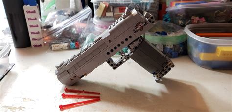 Fake Lego gun! It's full size and shoots. It also has a magazine with more ammo. : r/buildingblocks