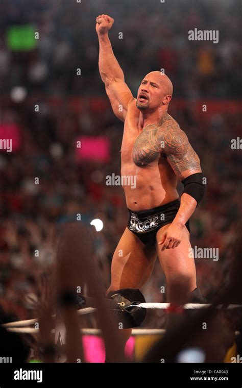 Dwayne "The Rock" Johnson defeats John Cena at Wrestlemania 28 Stock Photo - Alamy