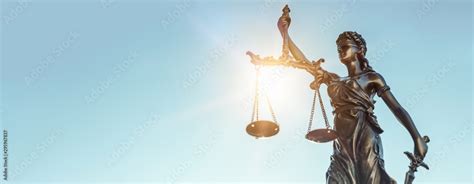 Lady justice. Statue of Justice on sky background Stock Photo | Adobe Stock