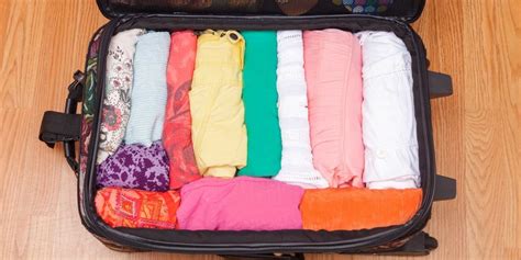 How to Fit Clothing in a Suitcase — How to Travel With Only a Carry On