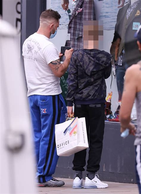 Tom Hardy cuts a casual figure as he goes shopping with his eldest son ...