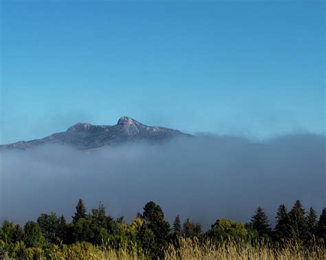 Heart Mountain Rising Out of the Fog Photograph by Tracie Fernandez - Fine Art America