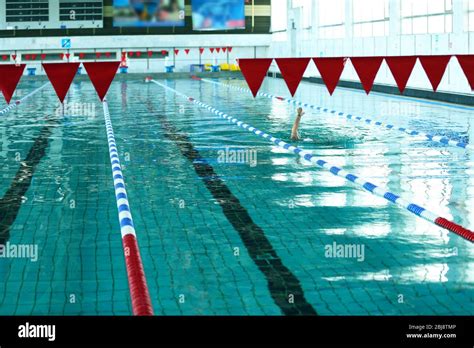 Swimming pool in the sport centre, indoors Stock Photo - Alamy