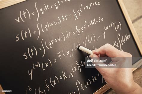 Math Teacher Writing On The Blackboard High-Res Stock Photo - Getty Images