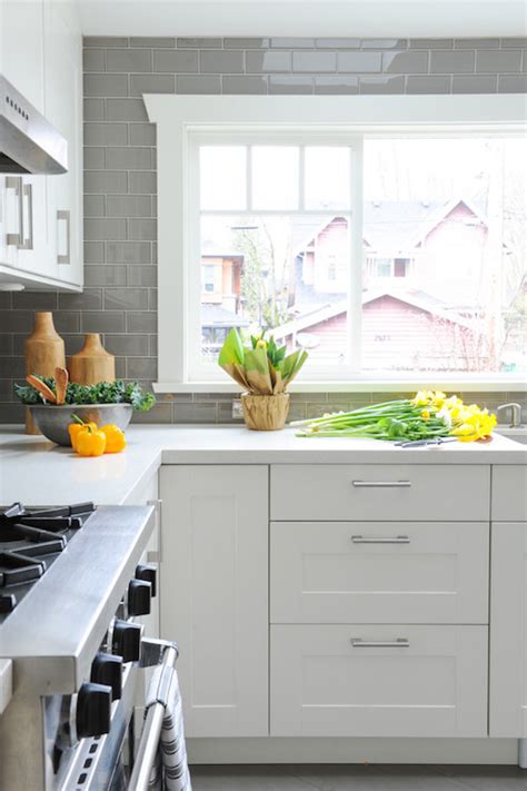 White Kitchen with Grey Backsplash - Transitional - Kitchen