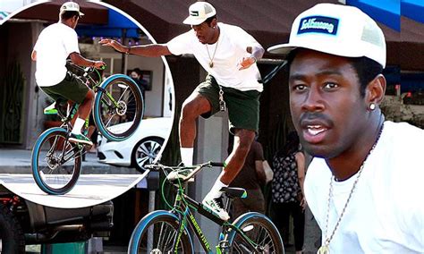 Tyler The Creator shows off his impressive bike skills as he rides around Venice | Daily Mail Online