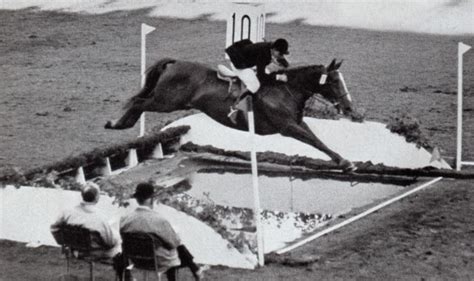 Pat Smythe and Flanagan leaping over an impressive water jump during the 1956 Stockholm Olympics ...