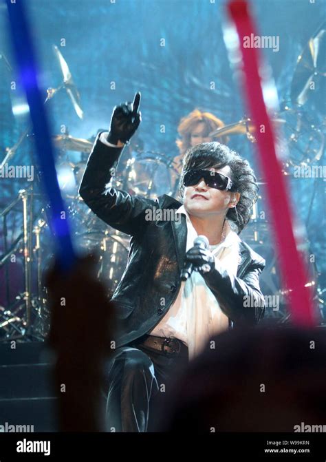 Toshi of Japanese heavy metal band X Japan performs in the X Japan concert at the Shanghai Grand ...