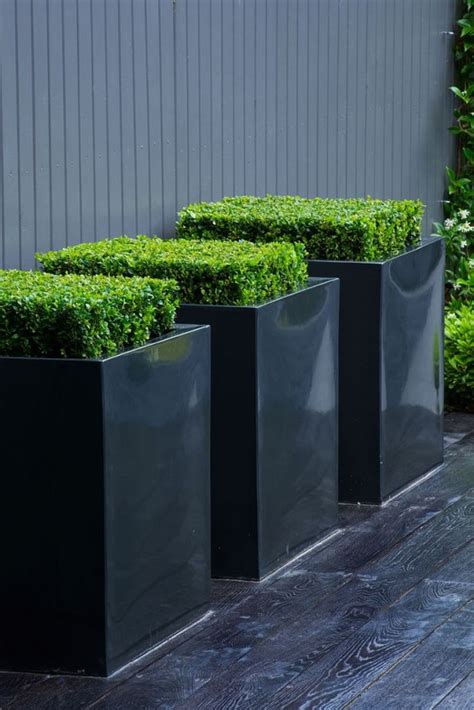 52 Modern Planters To Make Your Outdoors Stylish - DigsDigs