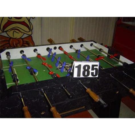 Coin operated dynamo foosball table